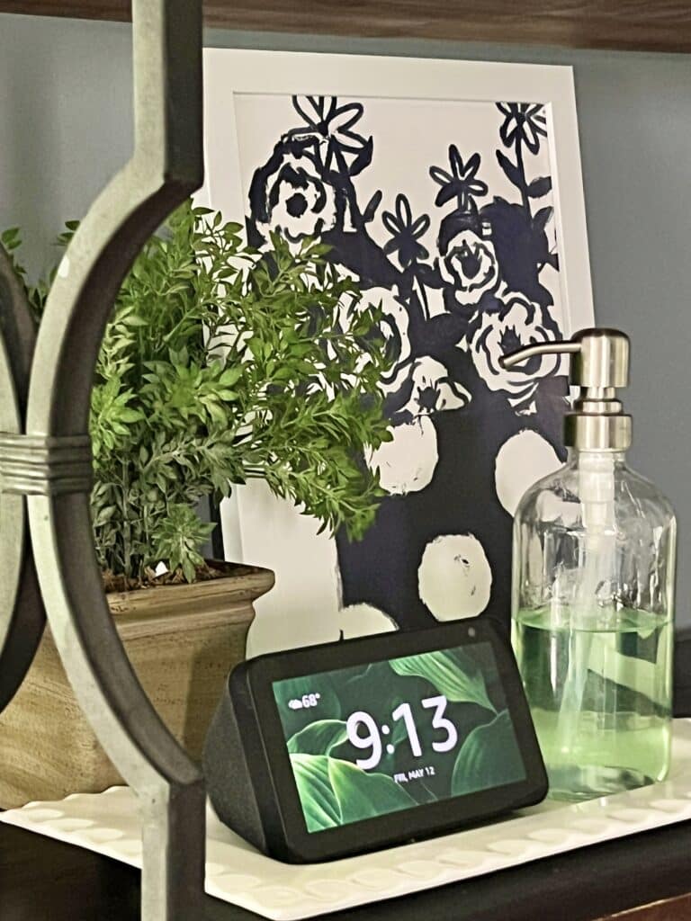 A bottle of hand sanitizer is placed in a handy spot on a metal rack shelf.