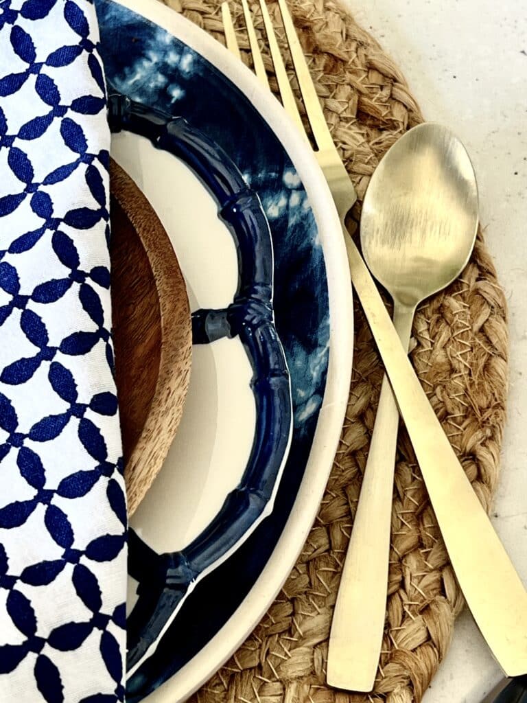 A table setting using jute placemats as its base.
