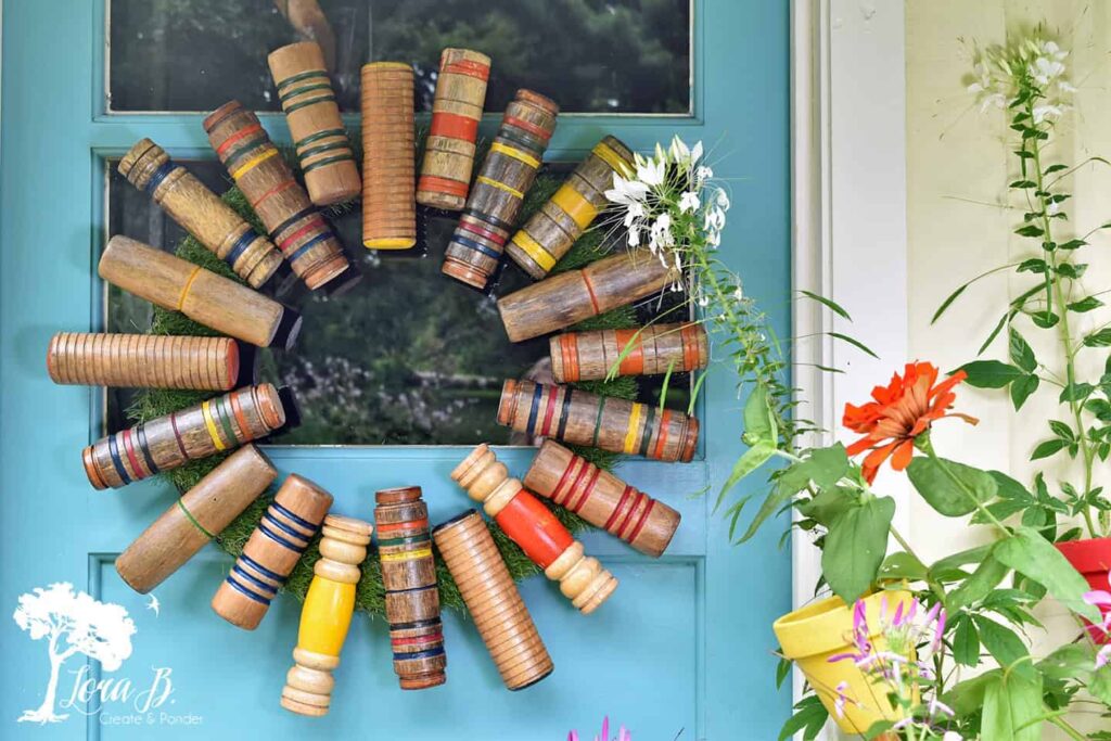 A door wreath made from croquet mallets from Create and Ponder.