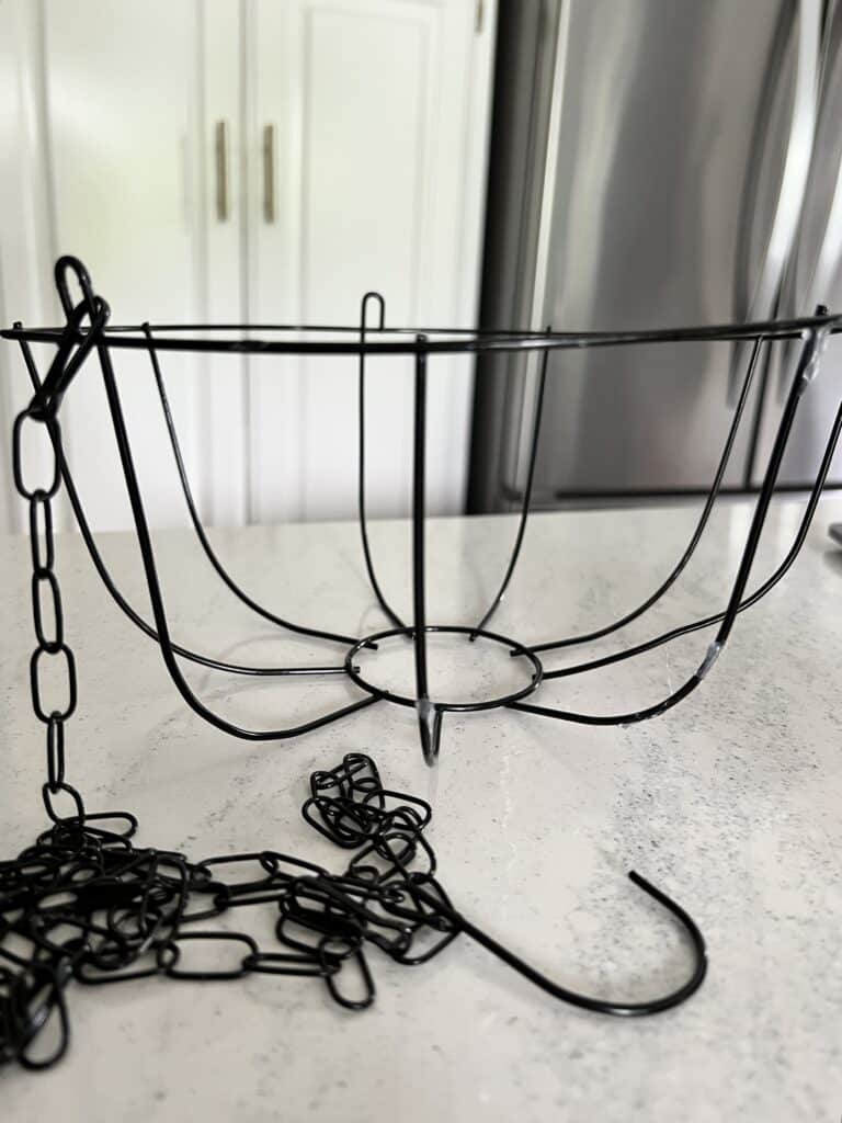 DIY oyster shell chandelier: A wire hanging basket