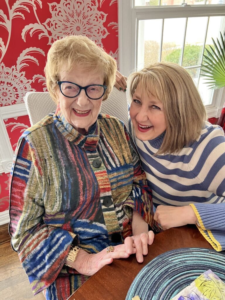 Missy and her mother at the dining room table.