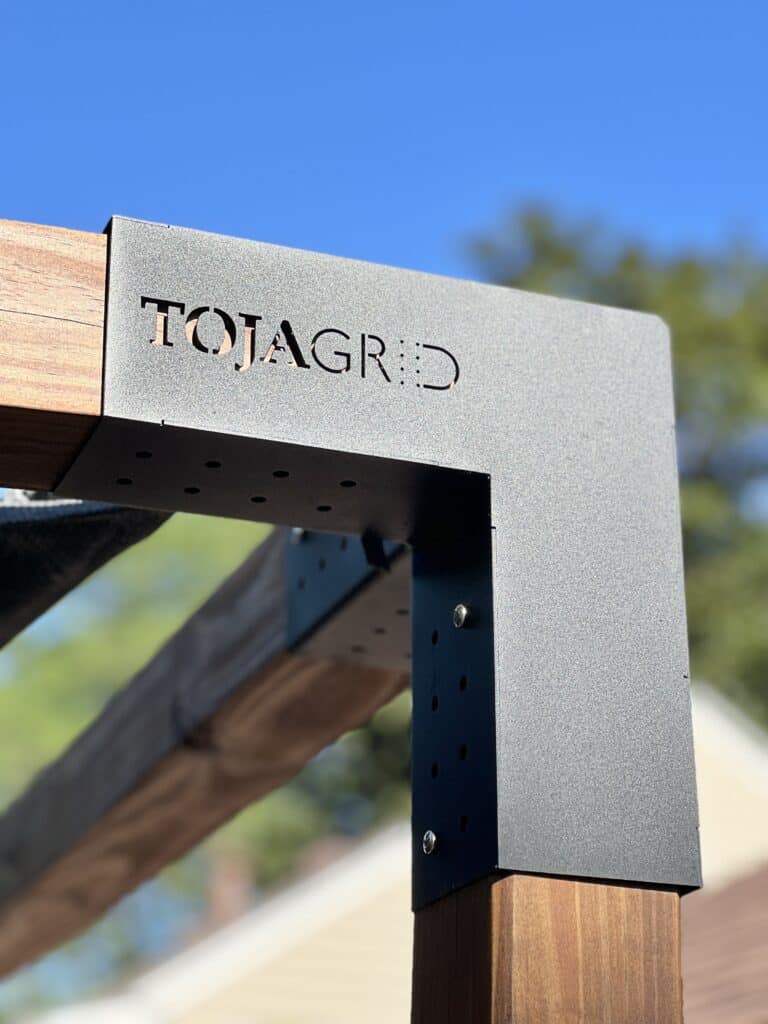 A hardware joint piece from Toja Grid DIY pergola kits.