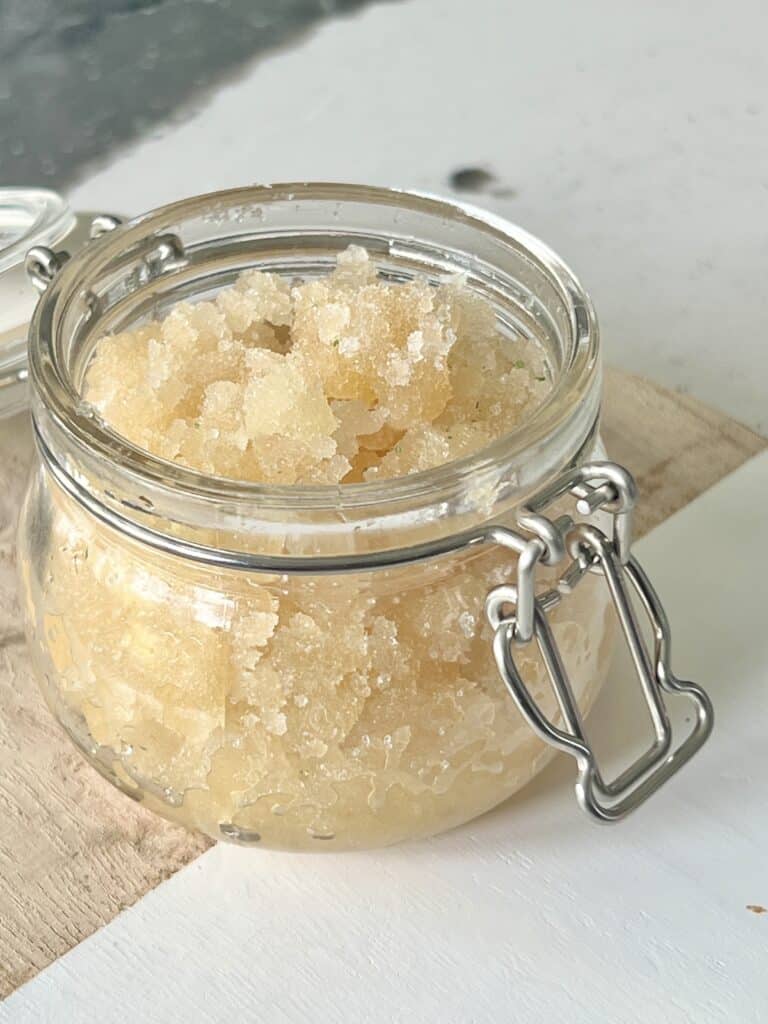 A DIY lip scrub in a glass storage jar.