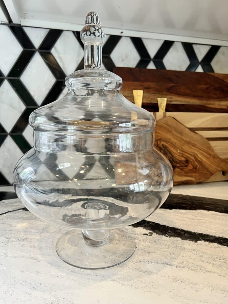 A glass apothecary jar in the kitchen.