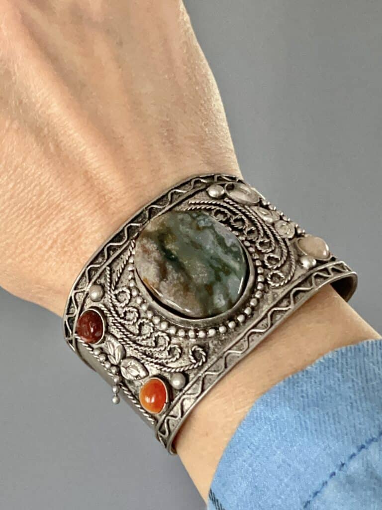 How to Wear a Cuff Bracelet with Style: A cuff bracelet filled with colorful stones