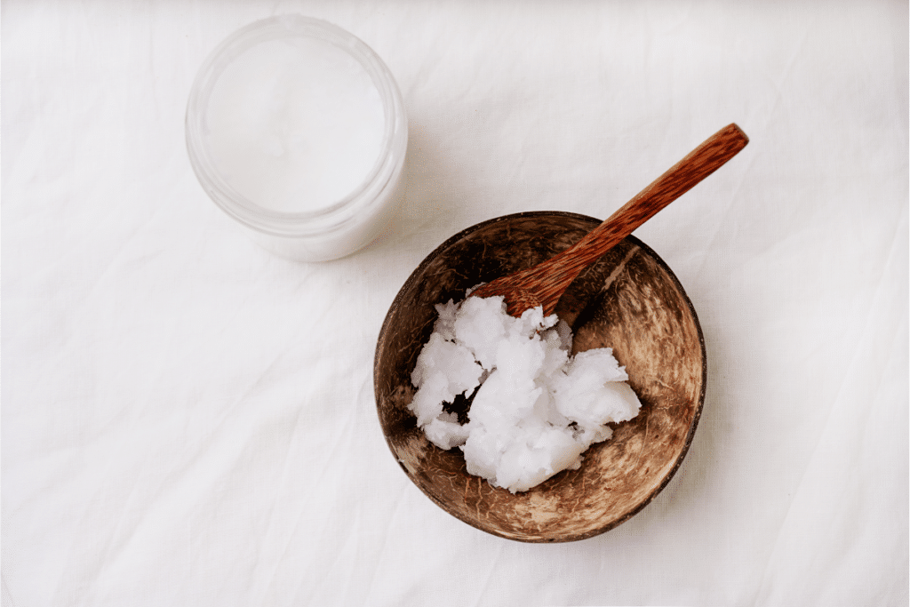 Benefits of lip scrub: coconut oil in a bowl.