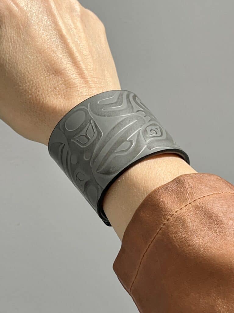 How to Wear a Cuff Bracelet with Style: An embossed grey leather cuff bracelet