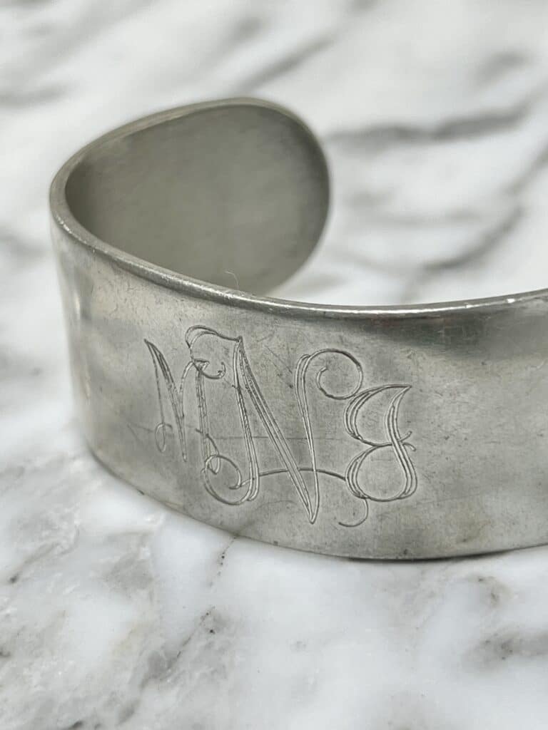 A vintage monogrammed cuff bracelet