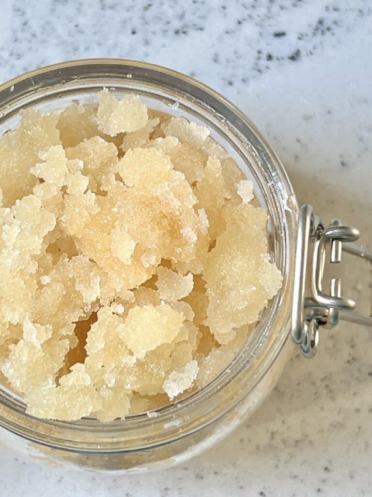 The Benefits of a Lip Scrub: an open jar of a DIY lip scrub.