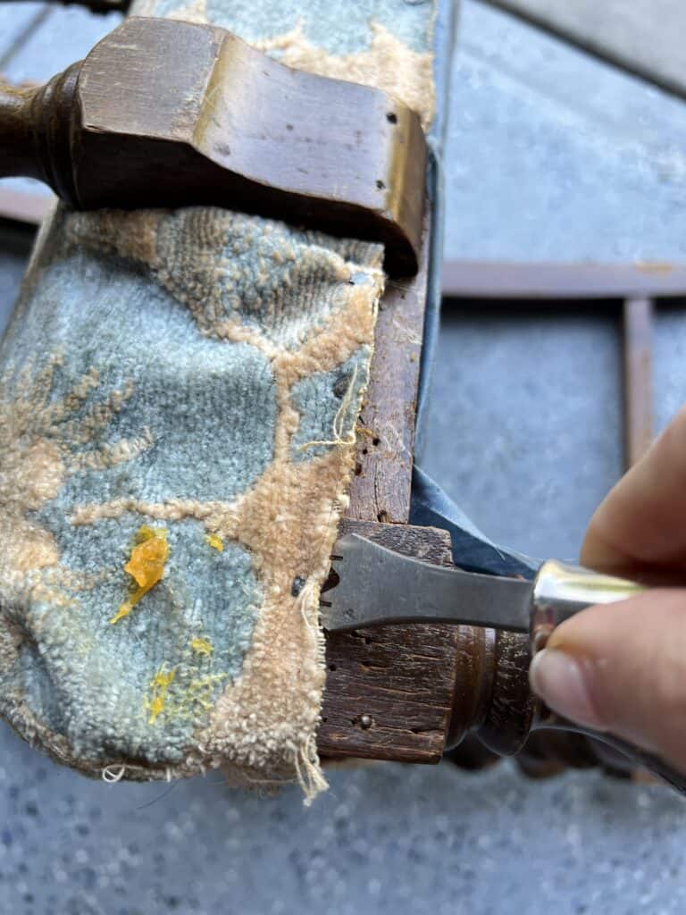 upholstery diy chair seat: removing the old fabric from a wood thrifted chair.