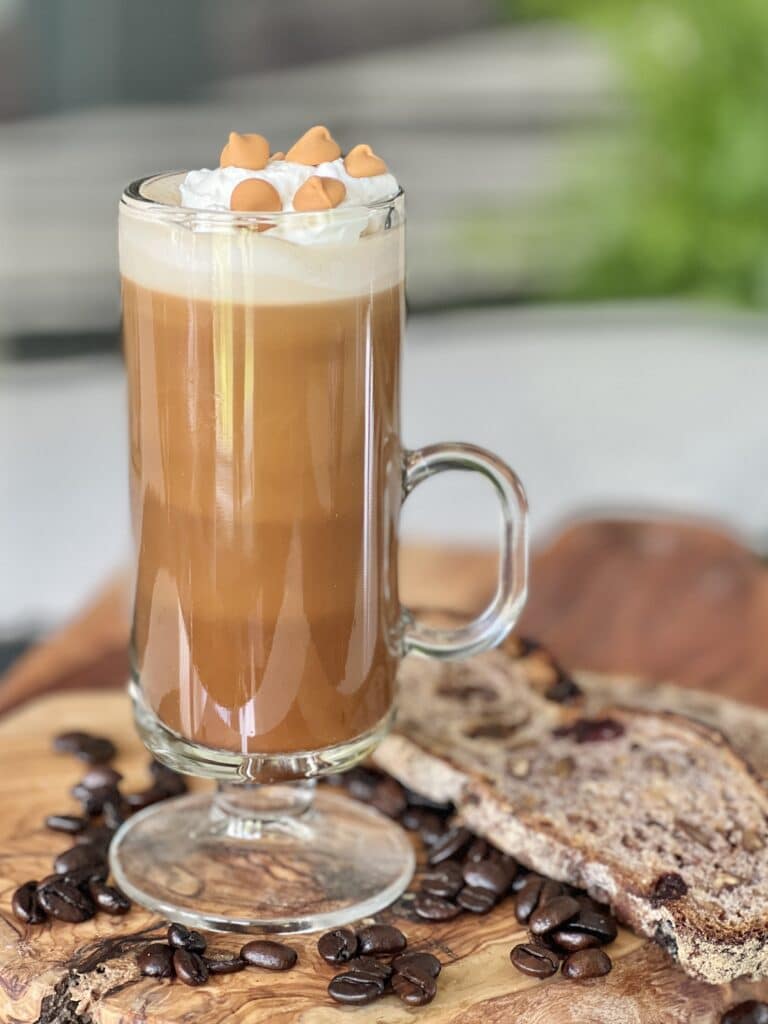 A smoked butterscotch latte recipe sitting on a countertop.