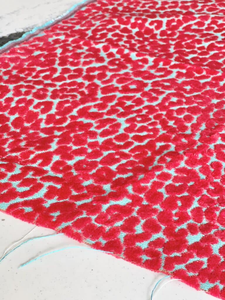 Red and light turquoise fabric.
