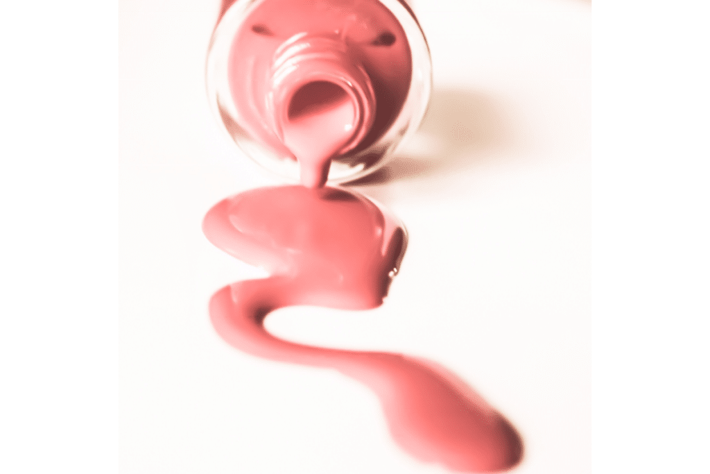 A bottle of spilled nail polish.