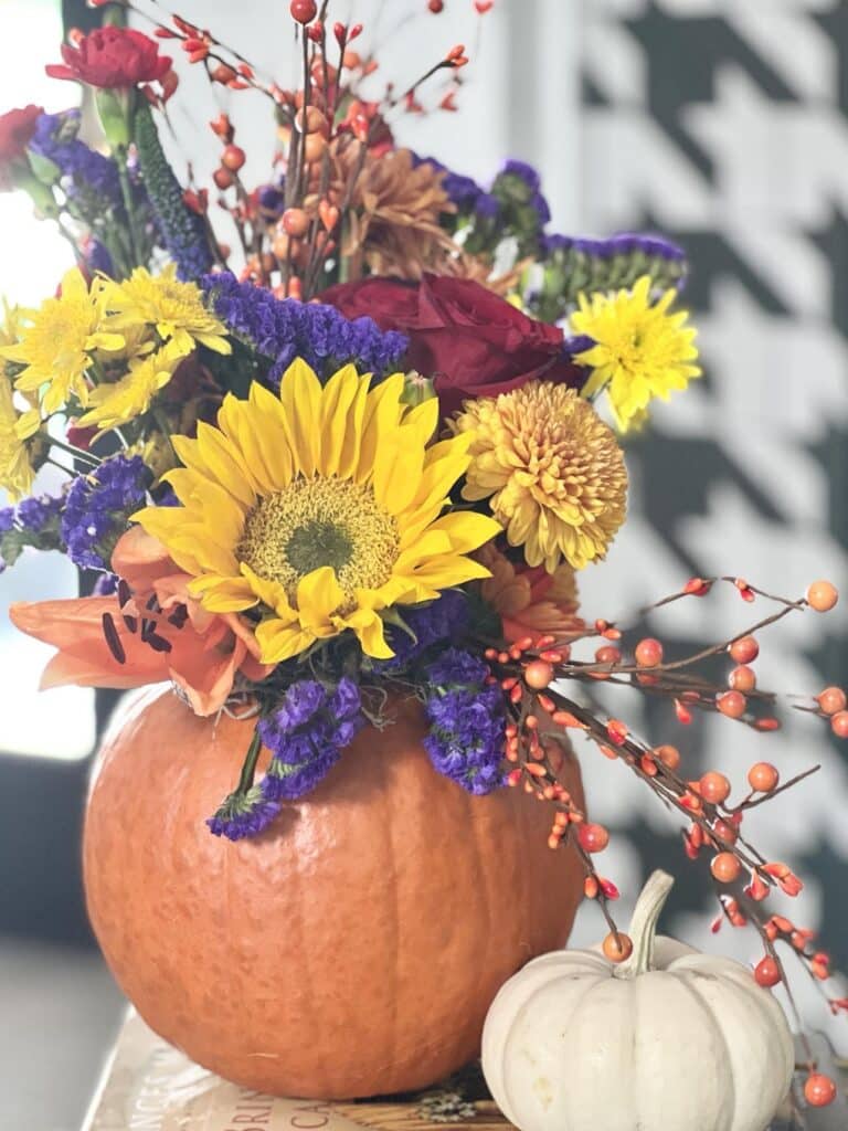 Multi-color pumpkin floral arrangements.