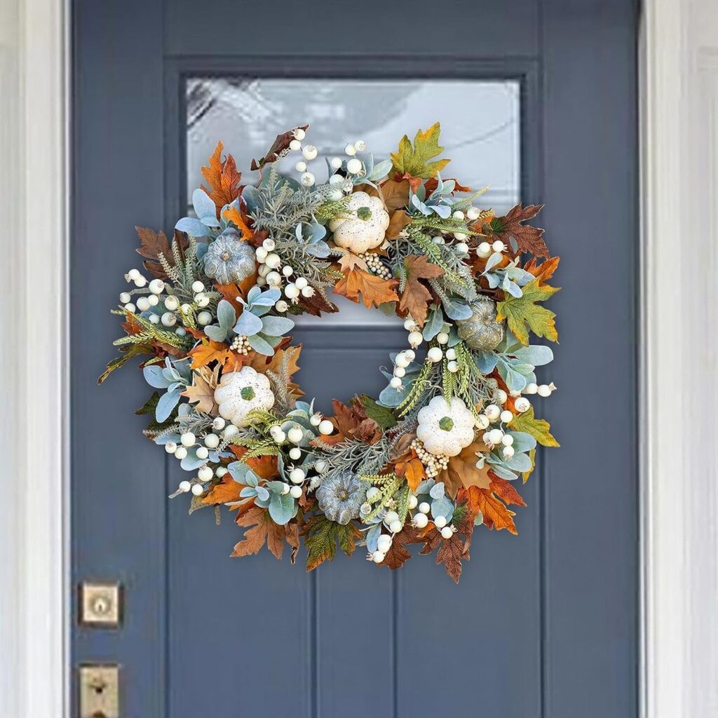 Fall wreaths for the front door made from lmbs ear, white pumpkins, and eucalyptus.