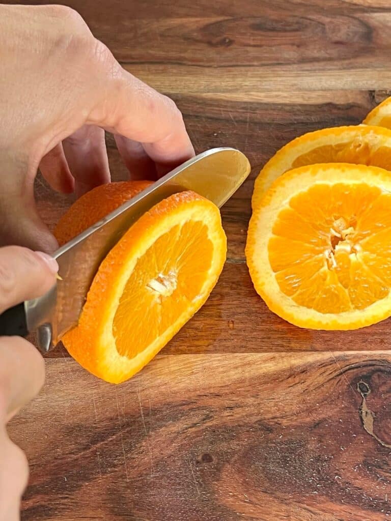 Slicing an orange.