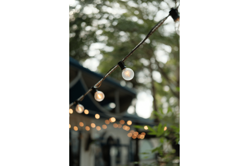 String lights decorating a front porch.