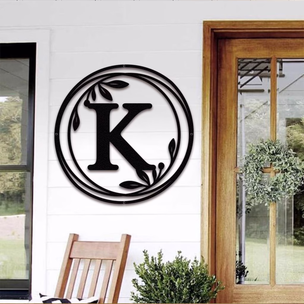 A metal monogram initial front door hanger for fall.