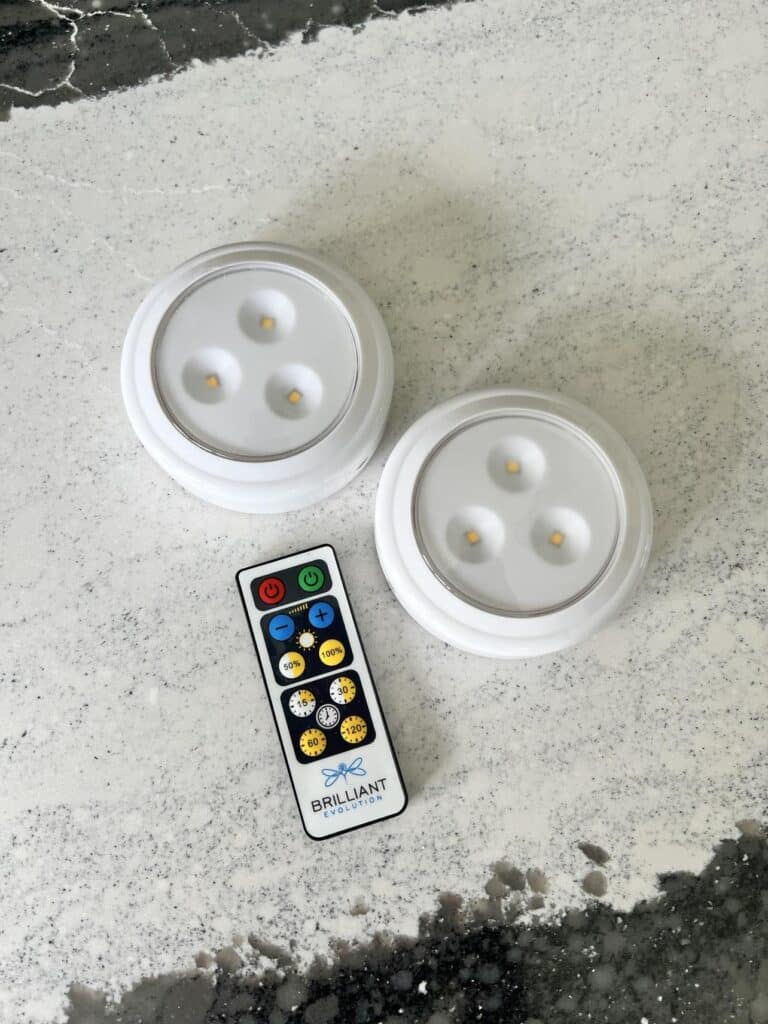 Battery operated LED puck lights with a remote control.