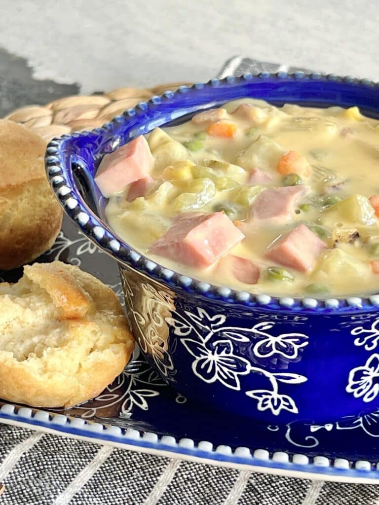 Crusty bread served with brown jug cheese potato soup.