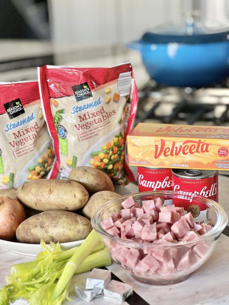 Potatoes, ham, mixed vegetables, Velveeta cheese, and cream of chicken soup.