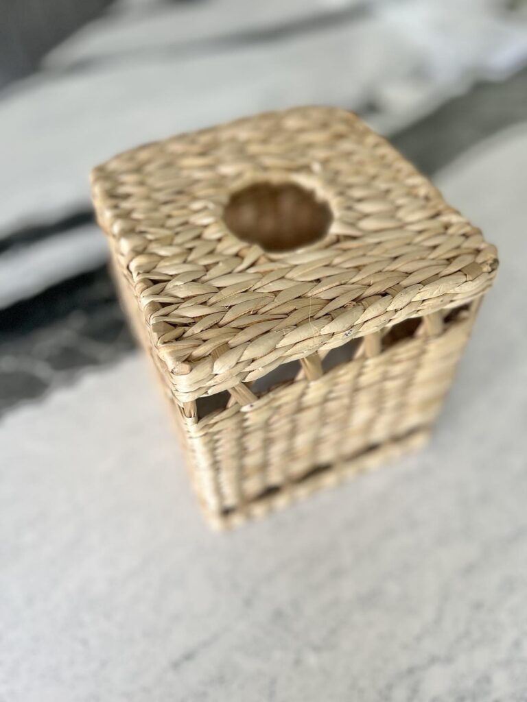 A rattan tissue box.