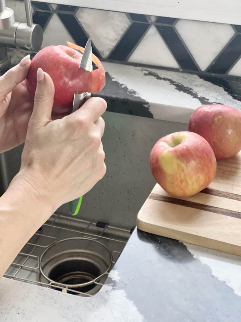 Paring apples.