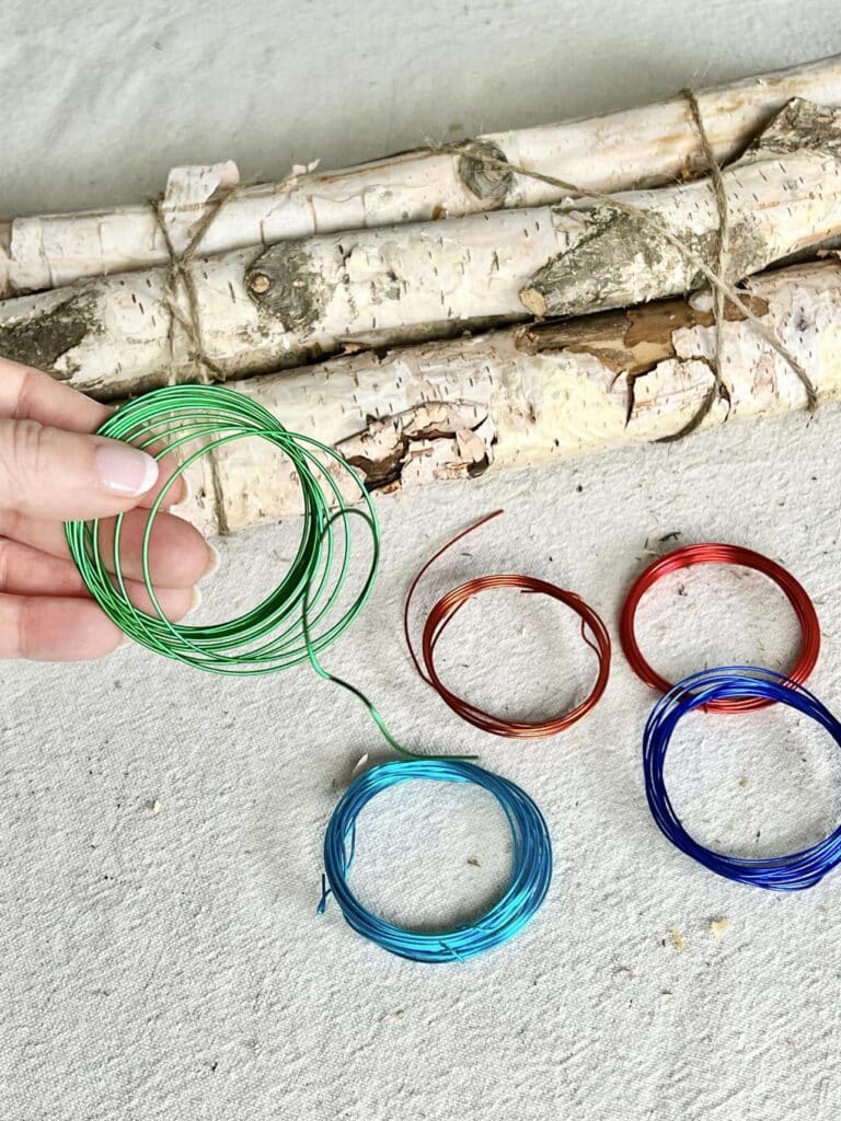 Colored wire used for DIY Flowers for Birch Logs.