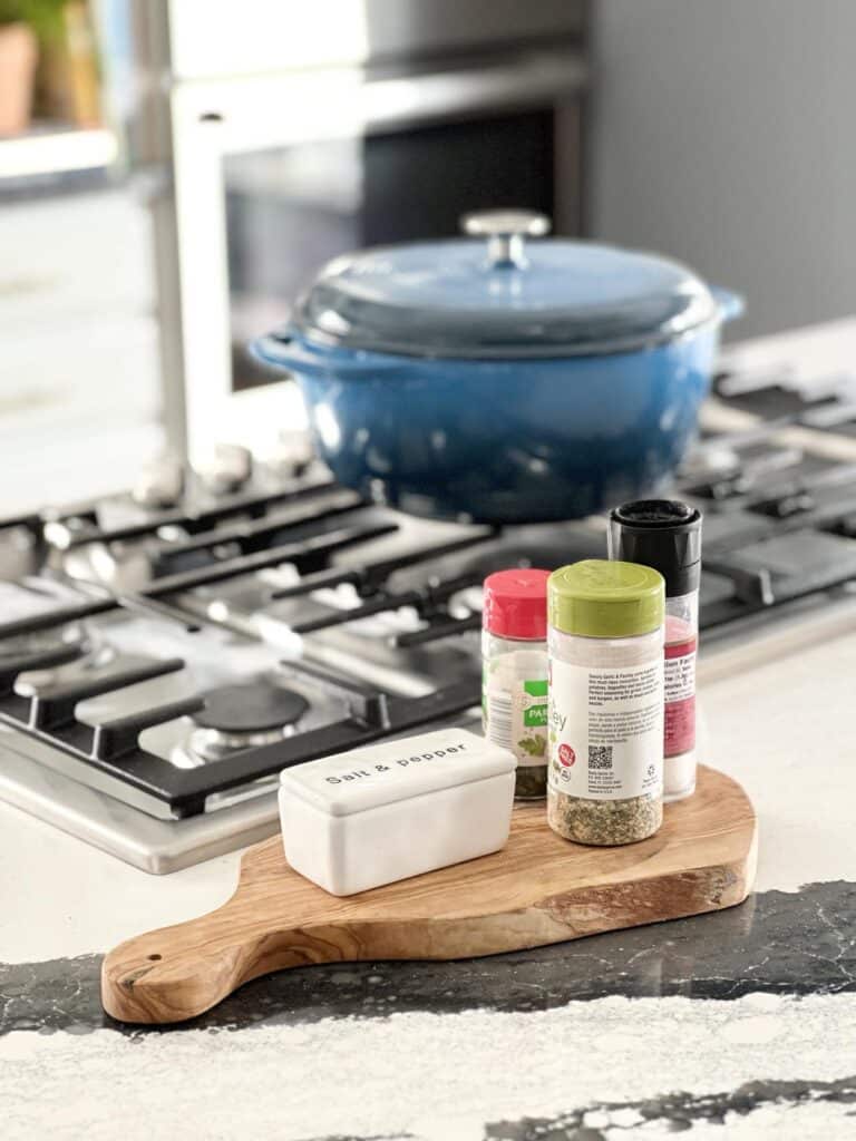 Displaying spices is a functional way for how to decorate a kitchen island.