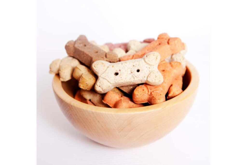 A bowl of store-bought dog treats.