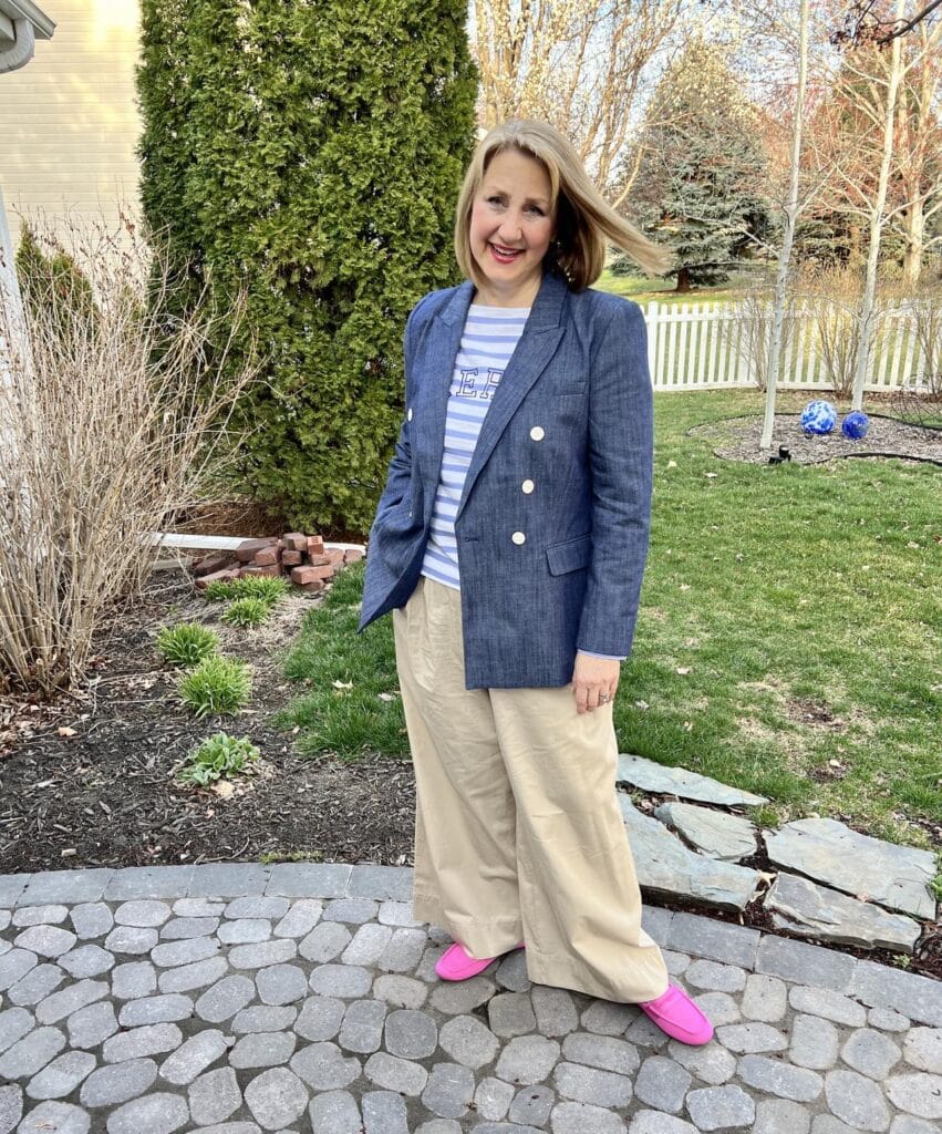 Missy wearing a faux denim blazer and stripe tee.