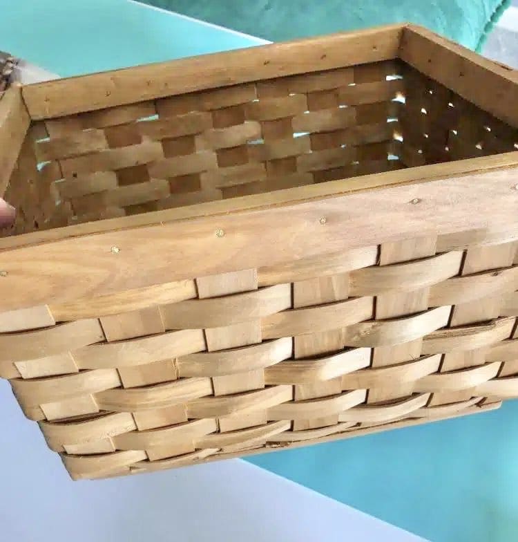 A brown basket used for how to make a may day basket.