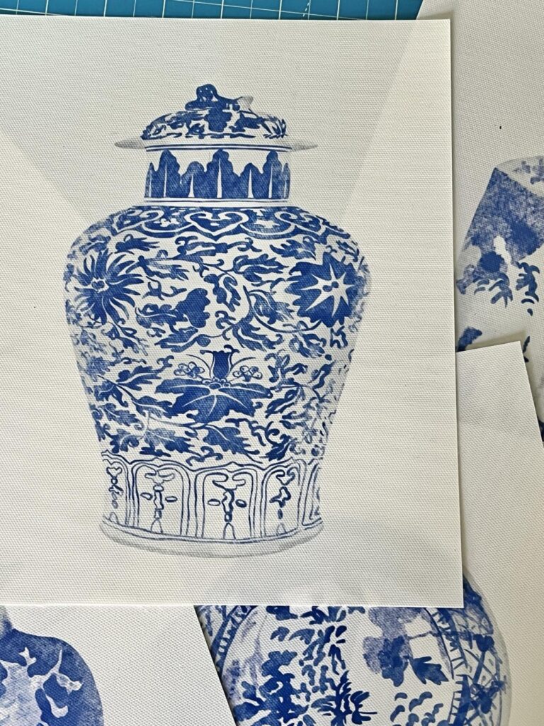 A blue and white vase art print to be used for DIY yarn wall decor.