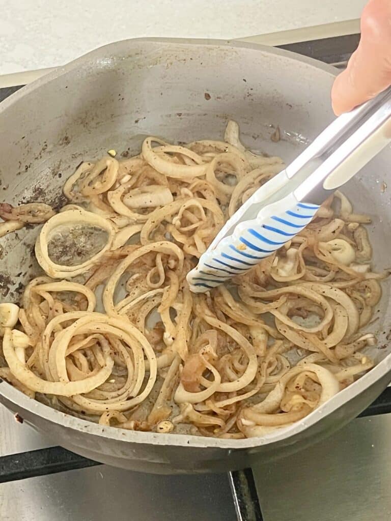 Cooking onion slices in butter.