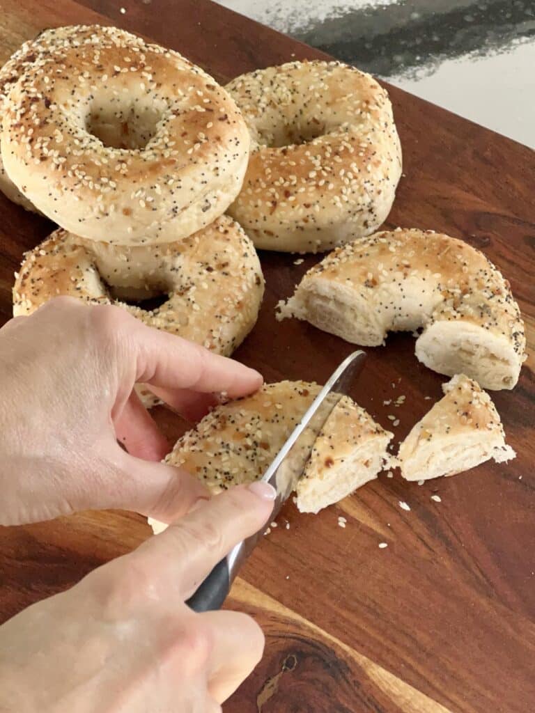 Cutting bagel chunks for everything bagel casserole.