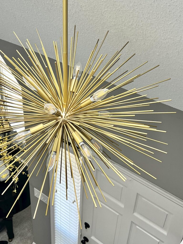 Glamorous decorating ideas include this metallic gold sputnik chandelier.