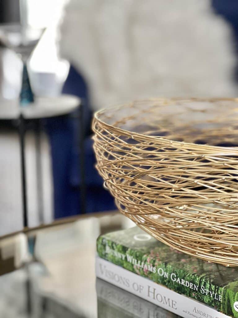 A gold metallic wire bowl is a glamorous home accent decorating idea.