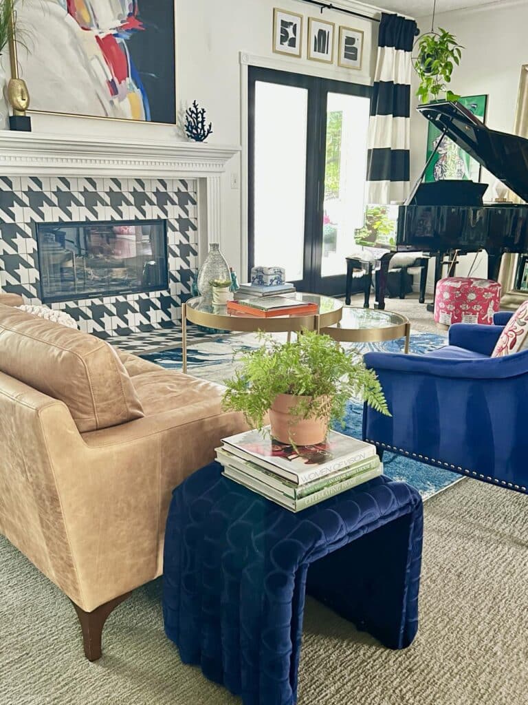 A coffee table ottoman diy styled in a living room.