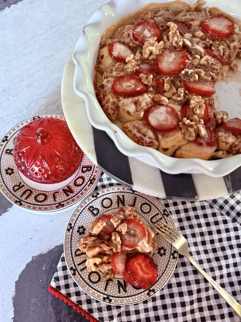 Strawberry Cinnamon Roll Casserole served on a plate.