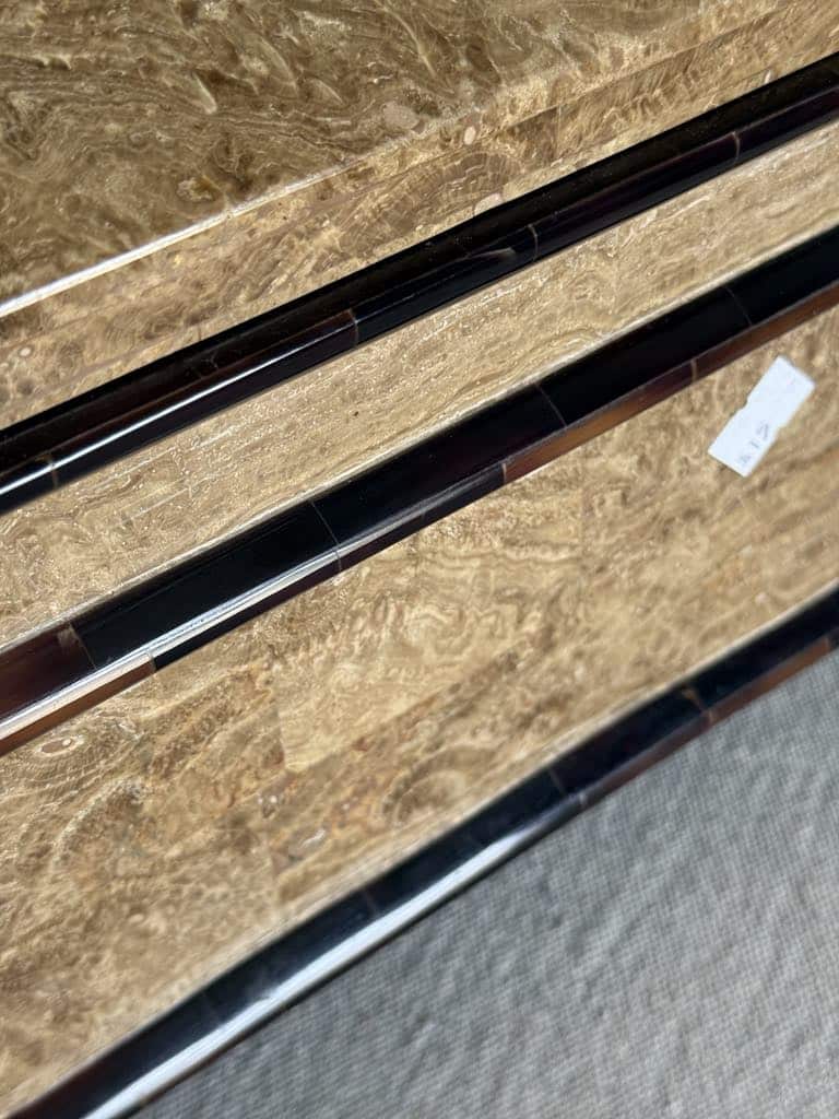 A faux travertine finish on a thrifted box.