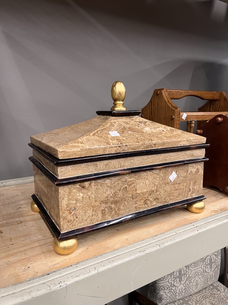 A lidded box thrift store decor find.