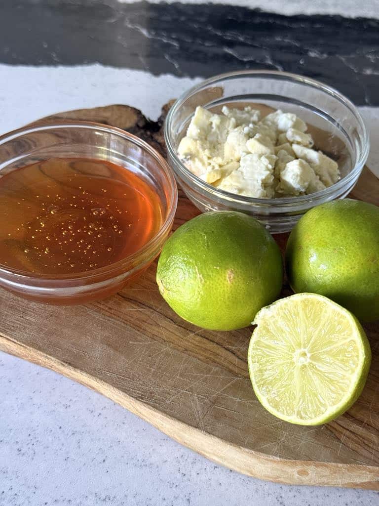 Honey, limes, and feta cheese for watermelon fruit salad dressing.