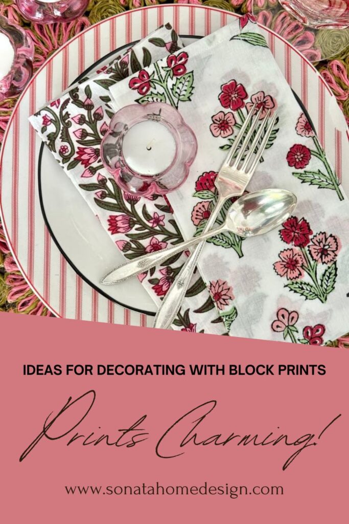 A table setting featuring pink and green block print fabrics.