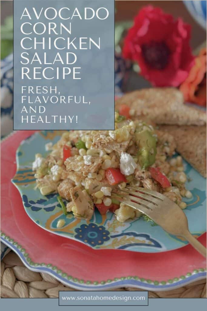 Avocado corn chicken salad recipe on a plate with fork.