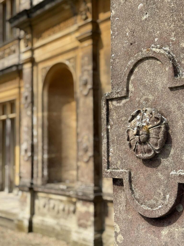 Bath stone carved rosettes on the exterior of Highclere Castle