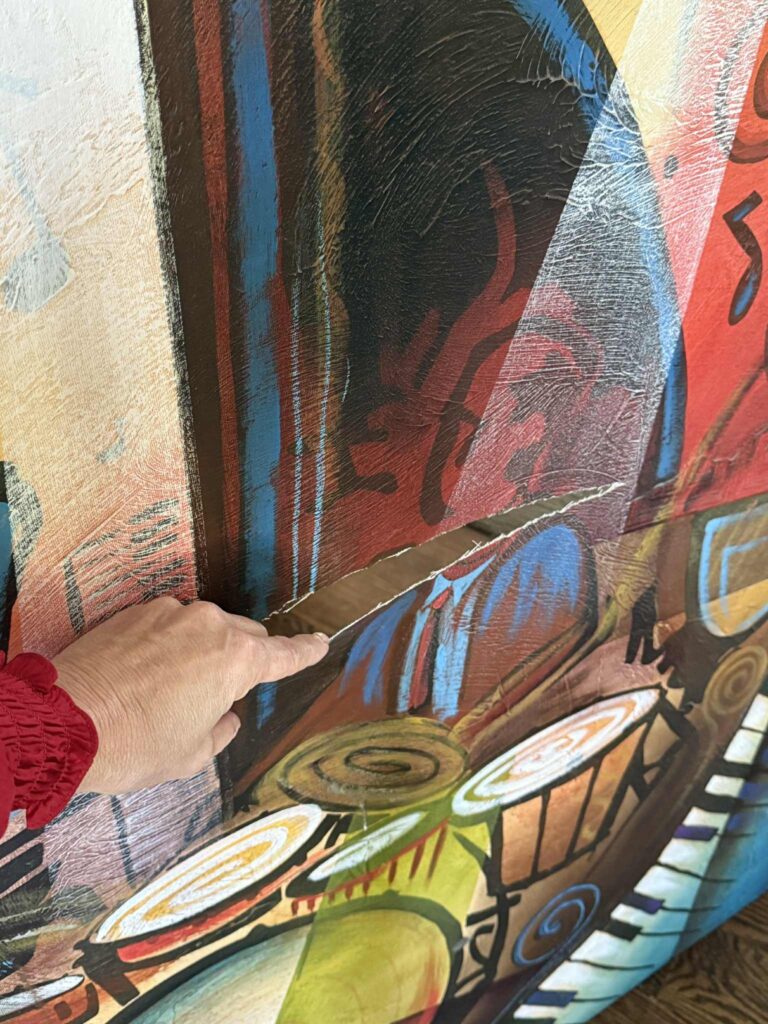 A tear in a canvas.
