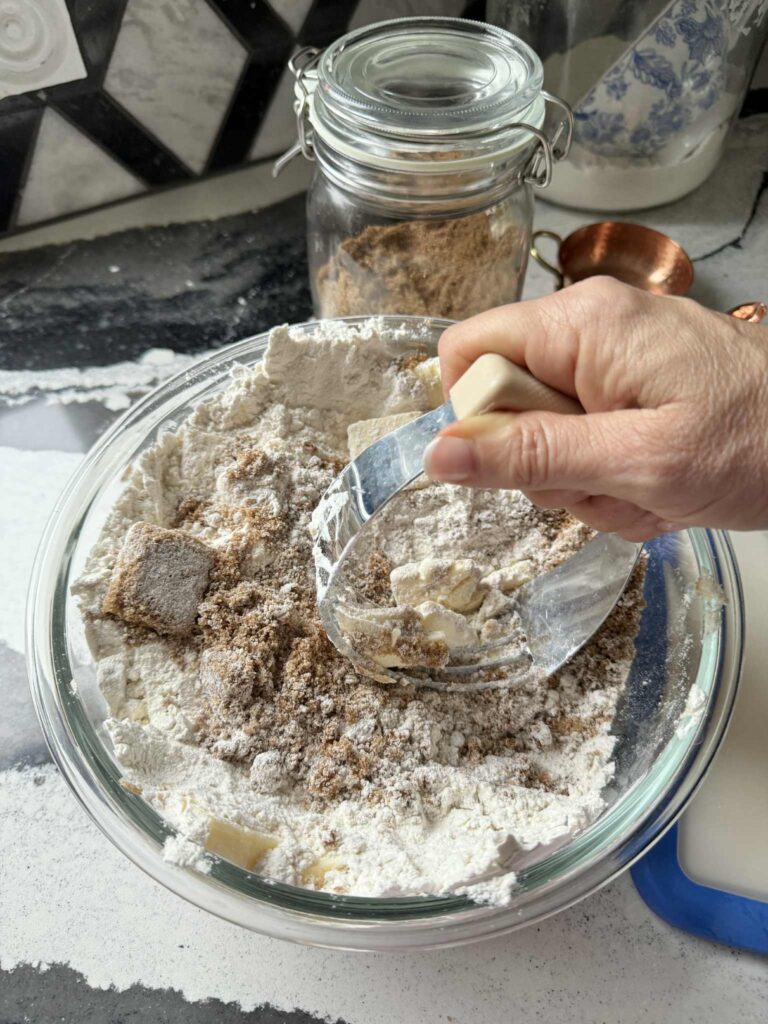 Mixing crust ingredients for a salty cookie bar.
