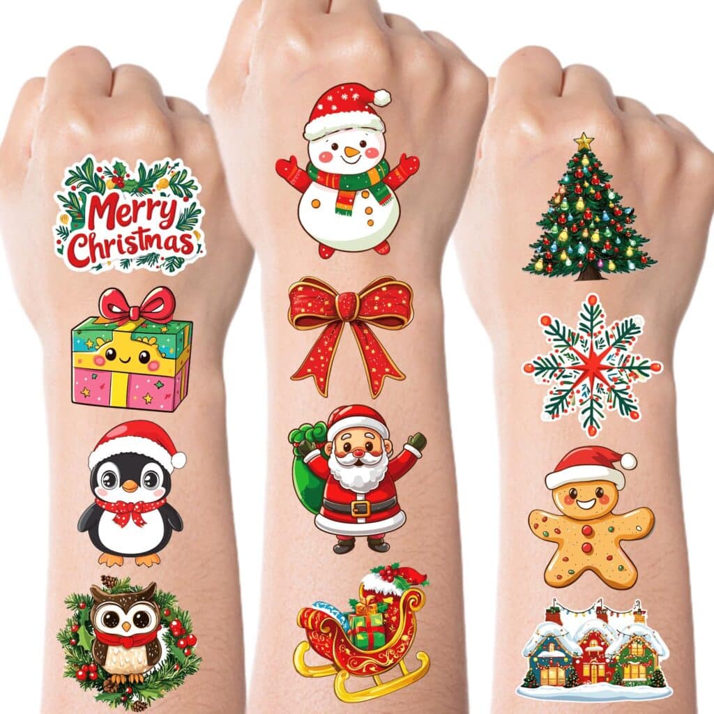 Christmas stickers on hands.