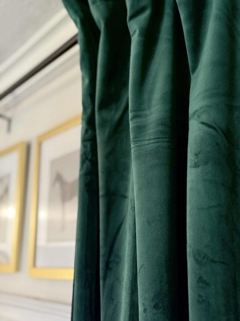 Green velvet drapes.