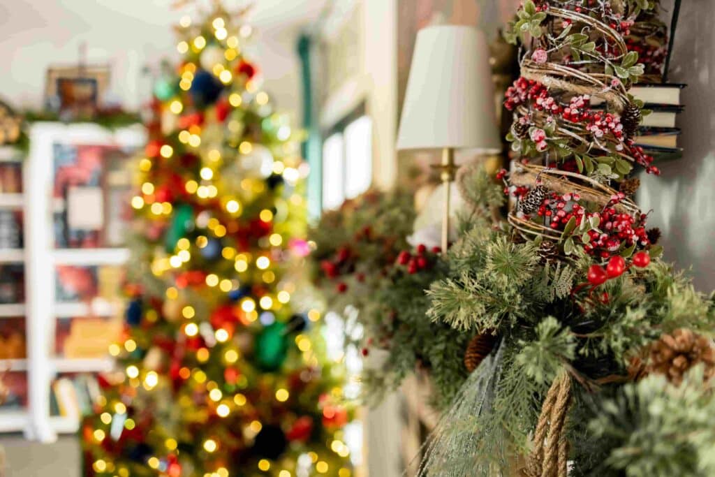 Christmas tree and green garland with Ralph Lauren aesthetic.